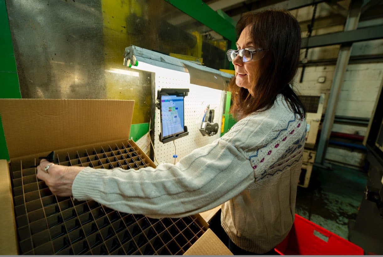 Woman working from the plant floor